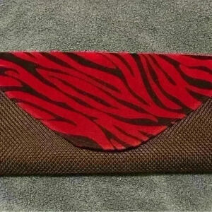 Stunning black and red clutch, hand woven zebra  print very clean condition